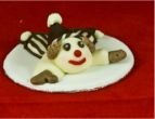 Chocolate clown cake topper.